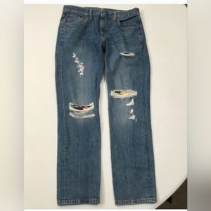 Levi's Distressed Blue Jeans With Patchwork.